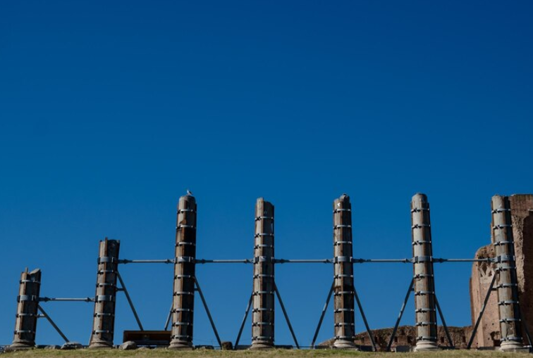 Repair My Concrete team installing helical piers in Denver